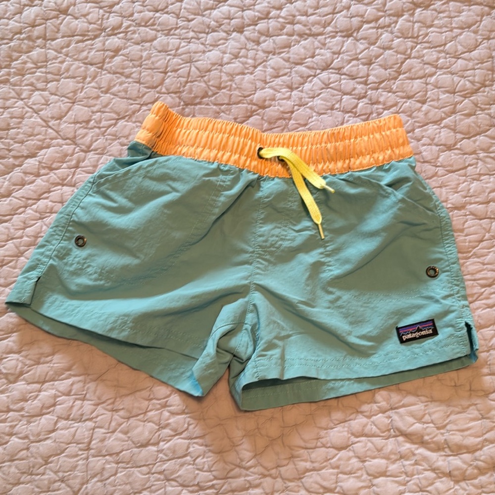 Patagonia girls 4 inch shorts. Size medium. Aqua and pale orange